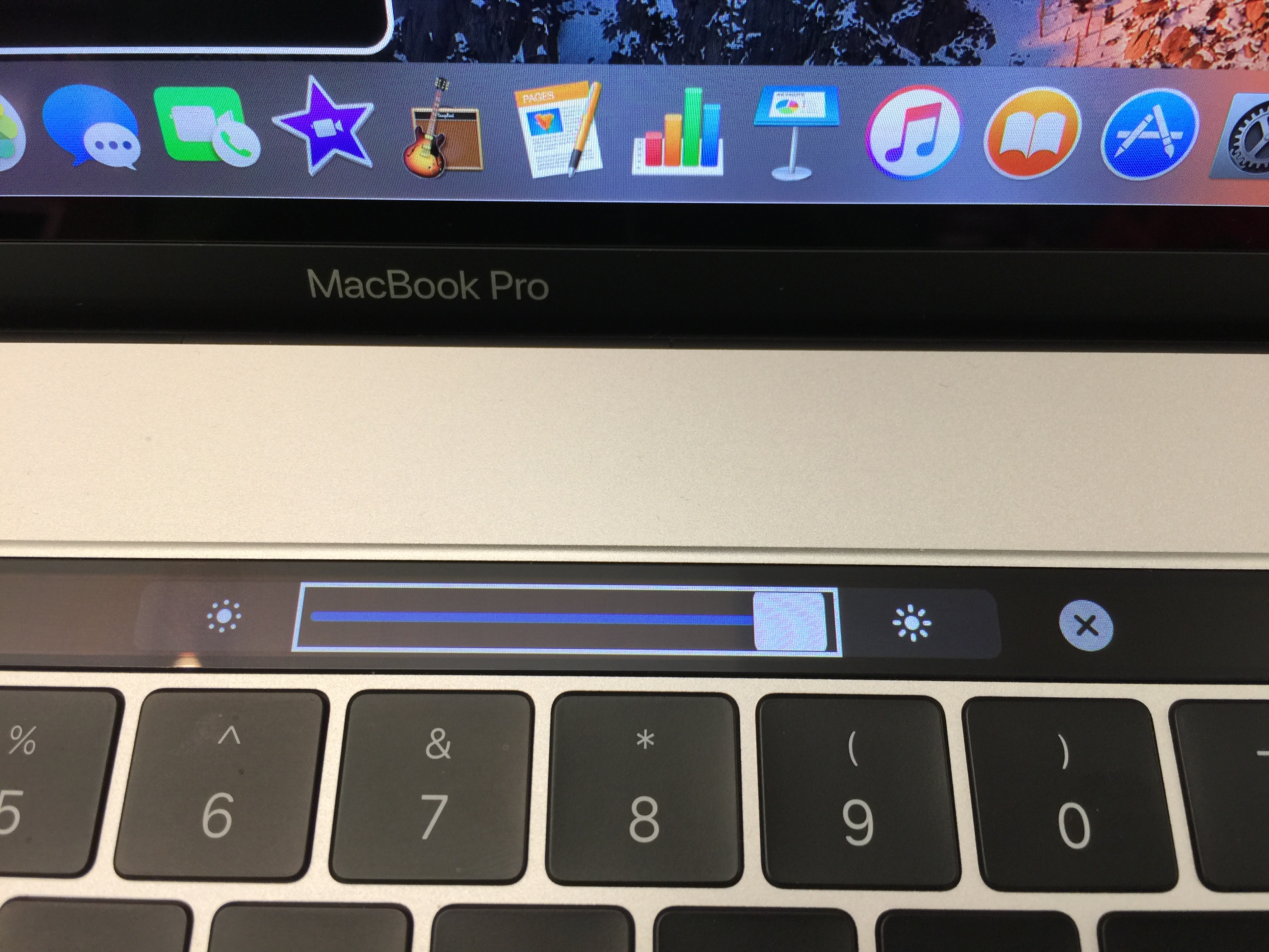 Brightness slider, with Close button on the right.